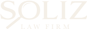 Soliz Law Firm logo featuring a magnifying glass symbol representing attention to detail and the firm’s focus on personal injury law.