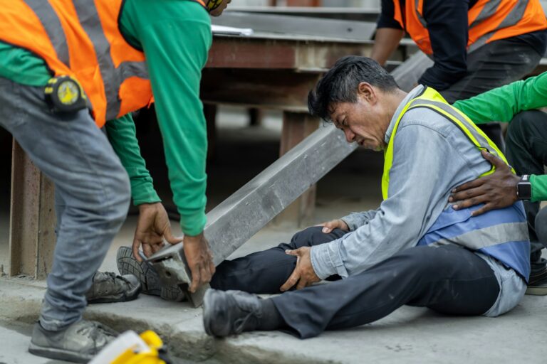 An engineer has an accident where steel falls on his leg at work